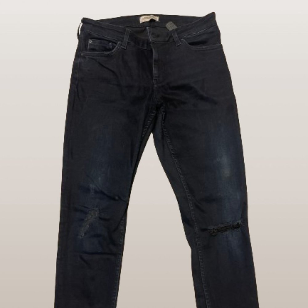 Ripped low rise jeans